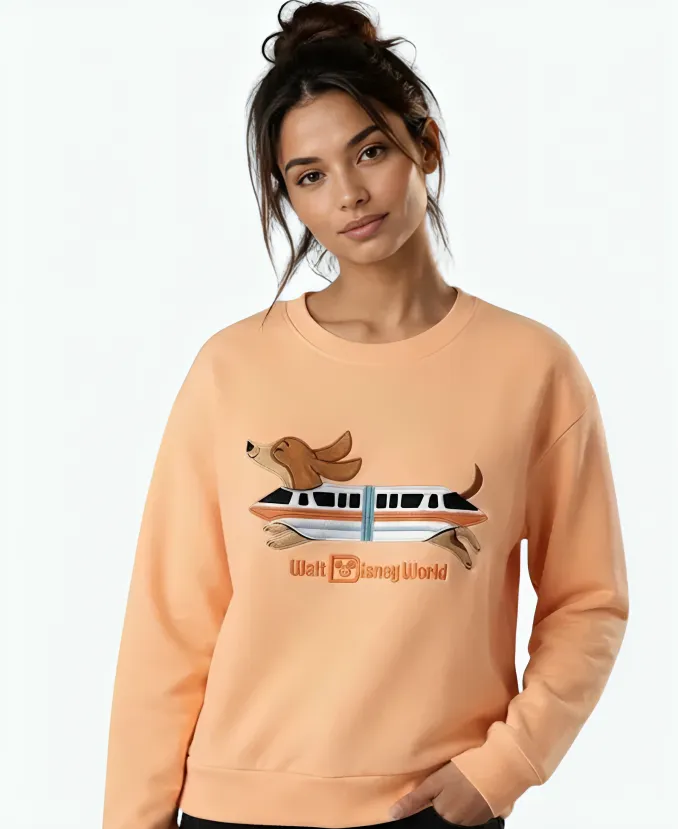 Unisex Disney Land Dachshund Sweatshirt Unisex Disney Land Dachshund Monorail Peach Sweatshirt
